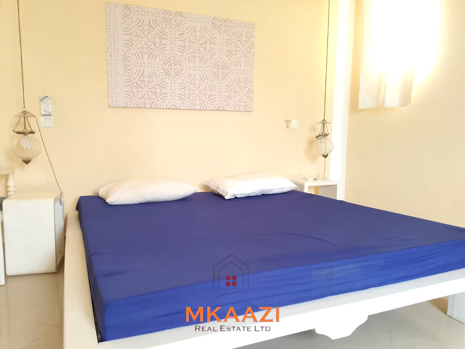 Luxury 2-bedroom apartment for sale at Mwembe Resort Malindi with pools, gym, spa, balcony, and resort amenities.
