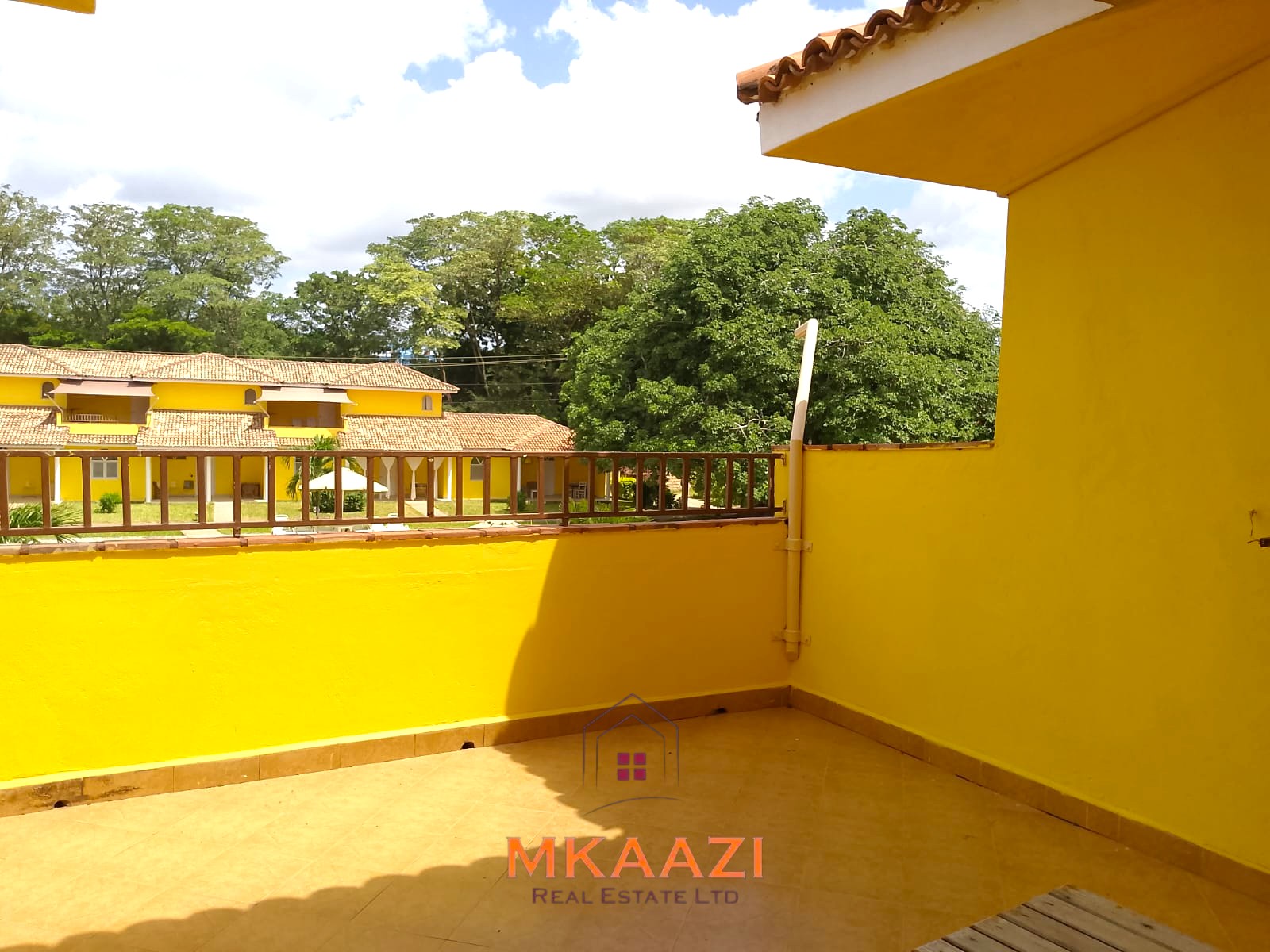 Luxury 2-bedroom apartment for sale at Mwembe Resort Malindi with pools, gym, spa, balcony, and resort amenities.