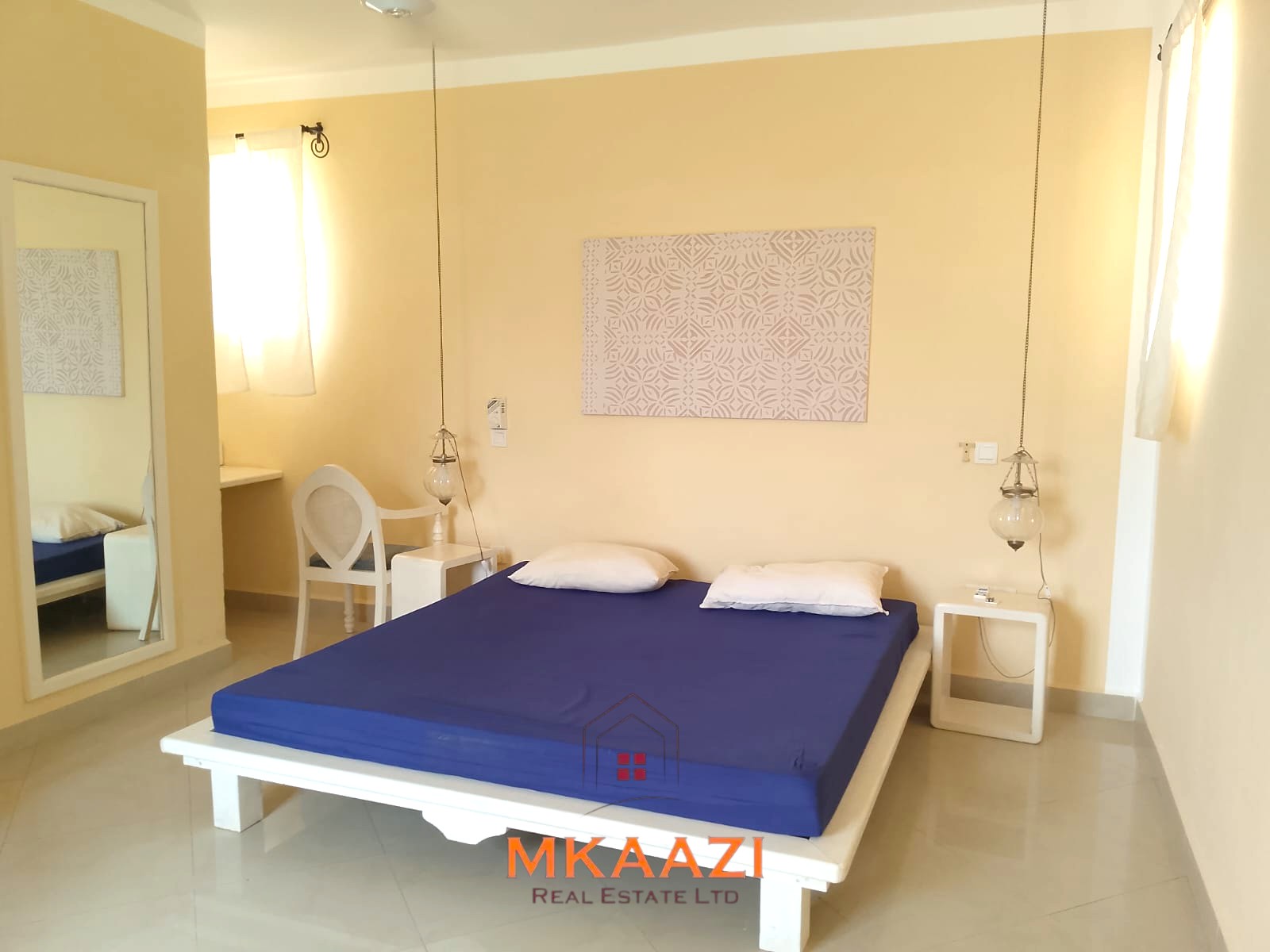 Luxury 2-bedroom apartment for sale at Mwembe Resort Malindi with pools, gym, spa, balcony, and resort amenities.