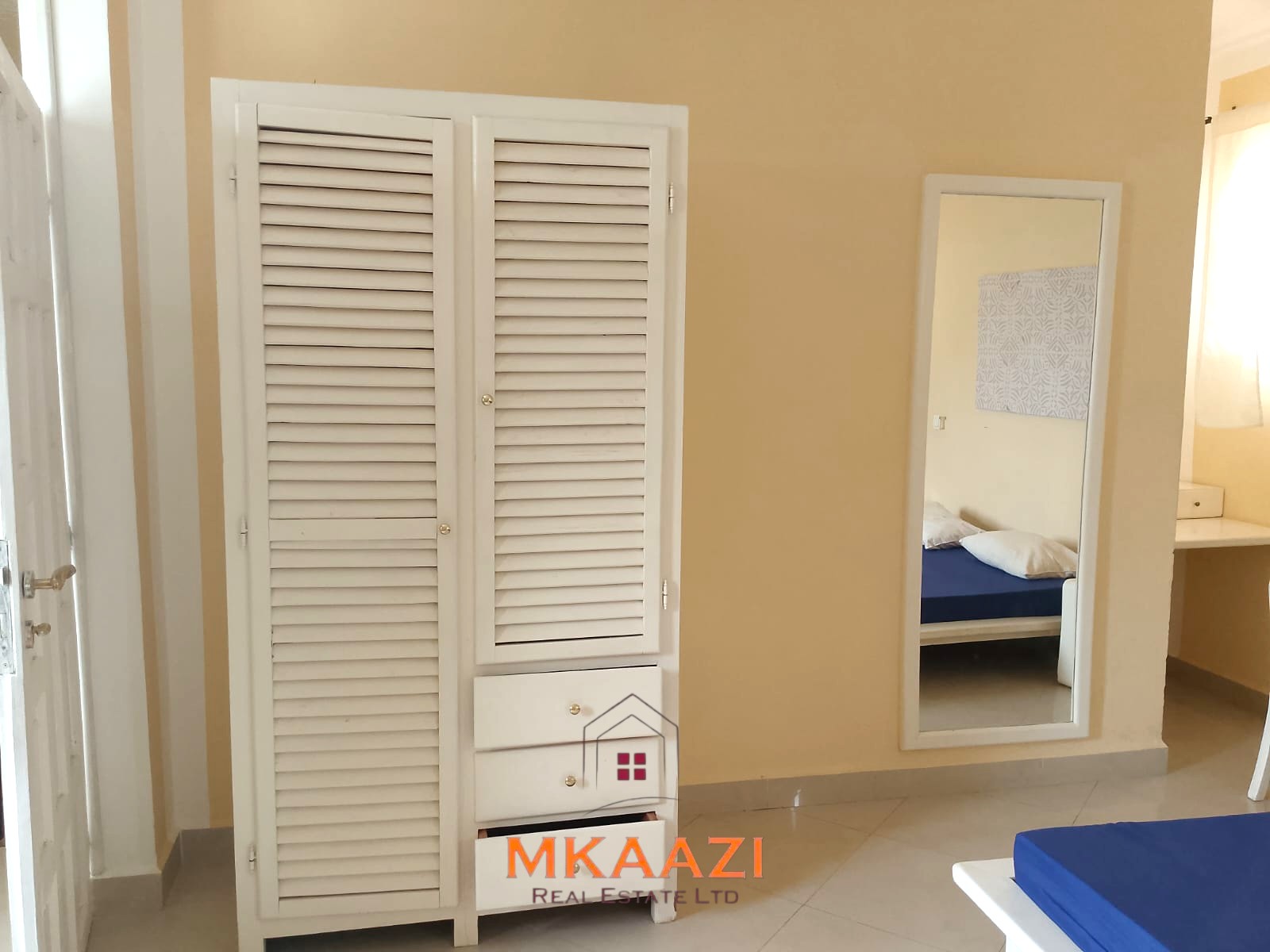 Luxury 2-bedroom apartment for sale at Mwembe Resort Malindi with pools, gym, spa, balcony, and resort amenities.