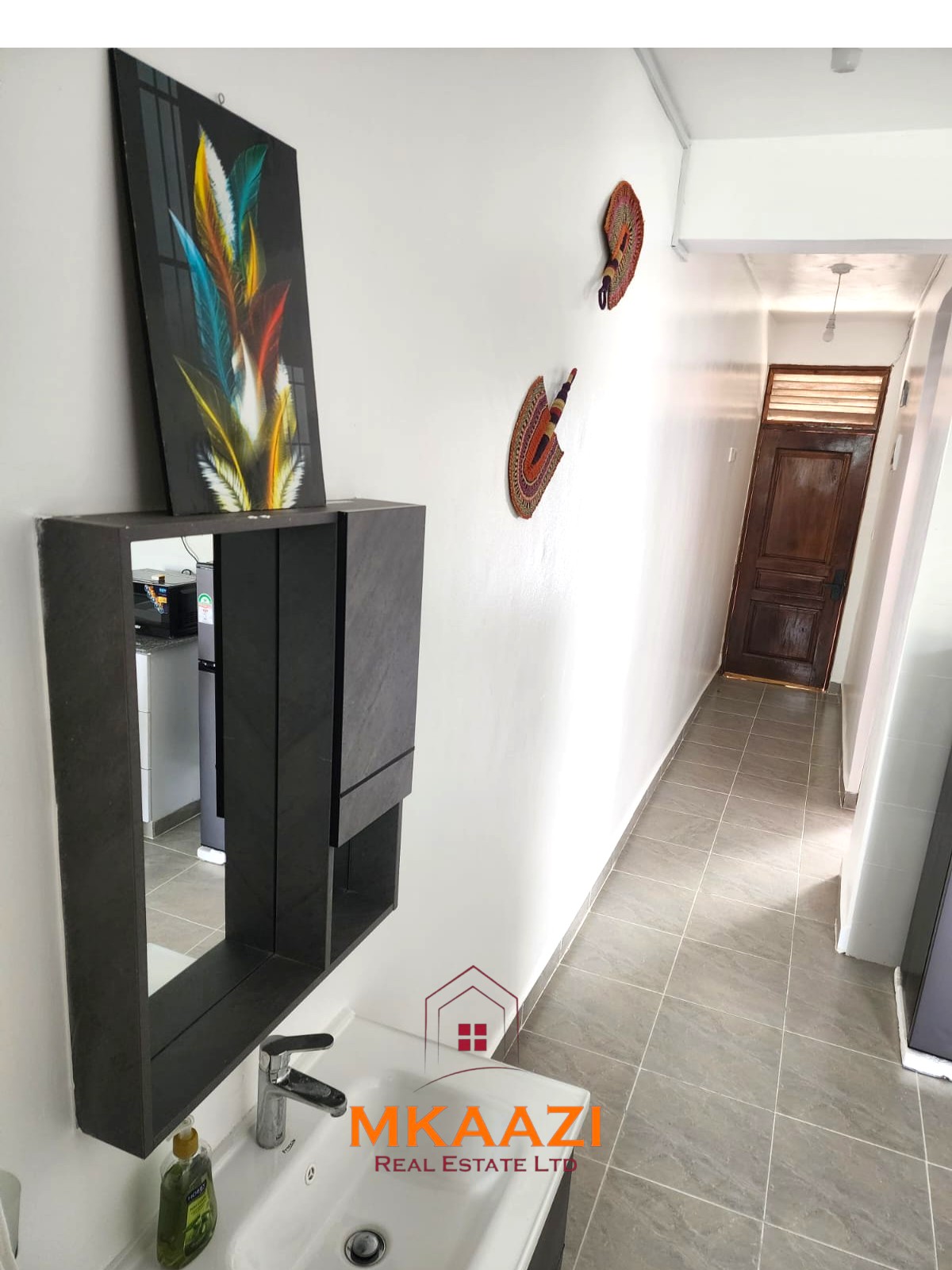Luxury 1-bedroom apartment for sale at Kijani Paradise Malindi with pool, balcony, WiFi, air conditioning, and beach access.