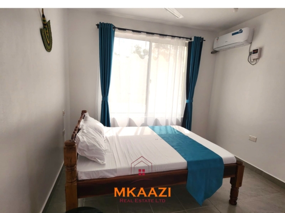 Luxury 1-bedroom apartment for sale at Kijani Paradise Malindi with pool, balcony, WiFi, air conditioning, and beach access.