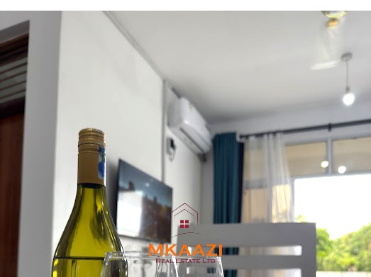 Luxury 1-bedroom apartment for sale at Kijani Paradise Malindi with pool, balcony, WiFi, air conditioning, and beach access.