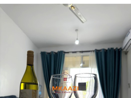 Luxury 1-bedroom apartment for sale at Kijani Paradise Malindi with pool, balcony, WiFi, air conditioning, and beach access.