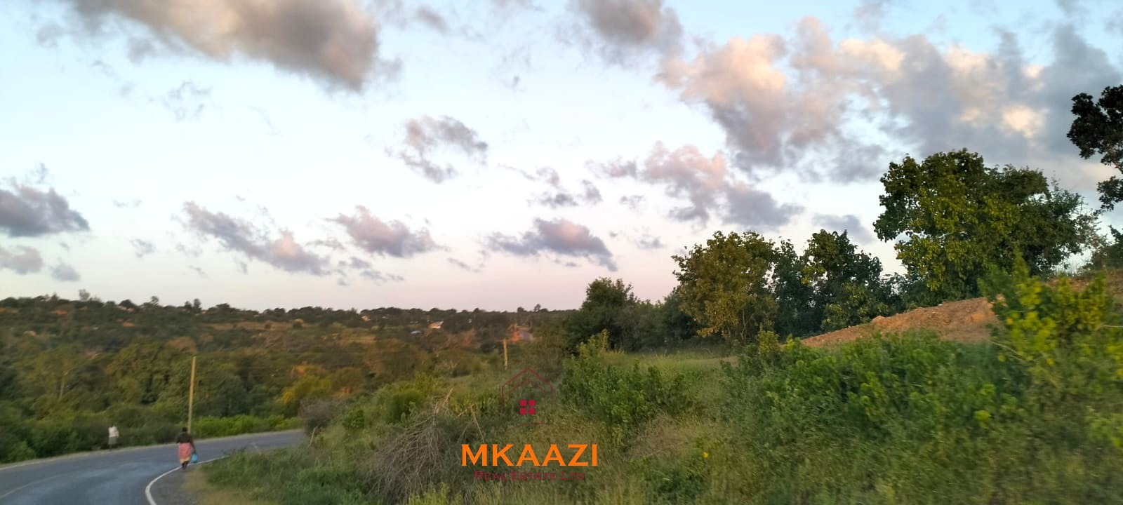 37 acres freehold cliffside road frontage land for sale at Marafa Bridge overlooking seasonal river and Marafa town ideal for agriculture, hospitality, and investment development.