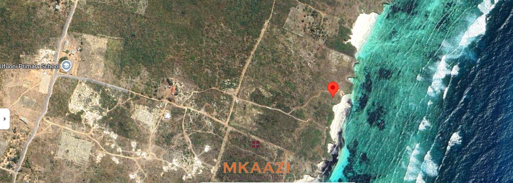 20-acre beachfront land for sale in Chumani featuring sandy beach access, gated and walled boundaries, coral bedrock foundation, and premium investment potential.