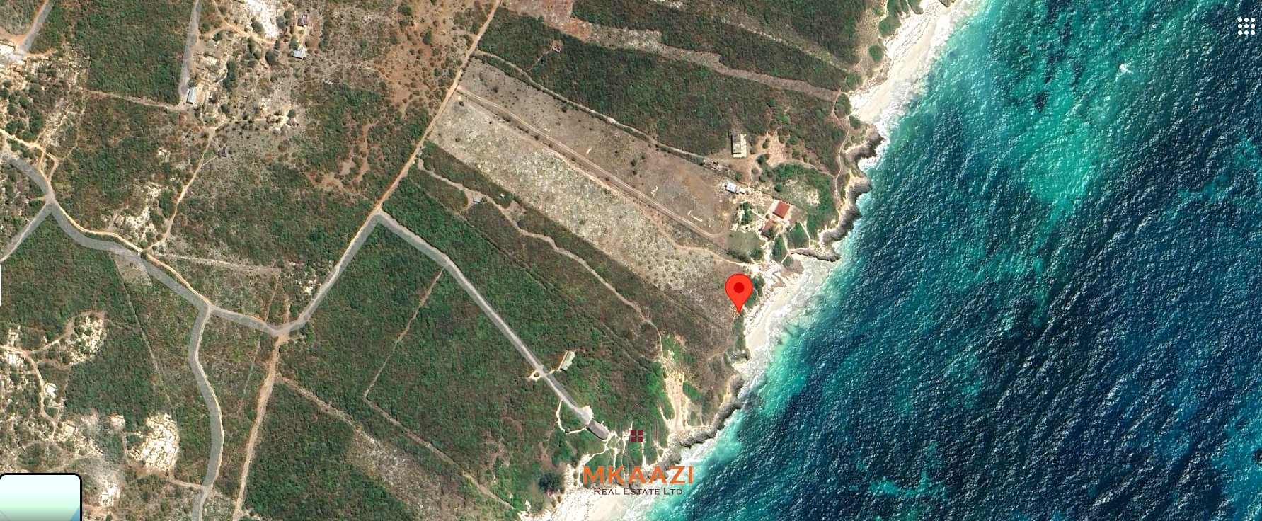5-acre beachfront land for sale in Uyombo featuring sandy beachfront access, freehold title deed, coral bedrock foundation, and prime investment potential along Kenya’s North Coast.