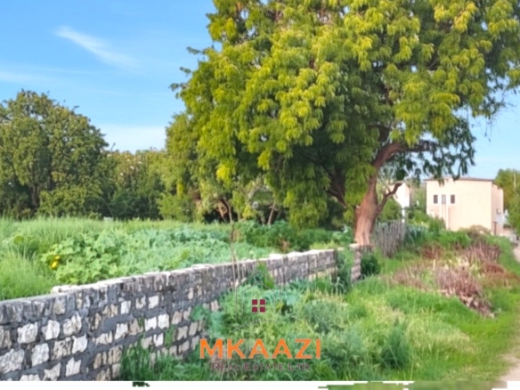 Prime 1-acre second-row beach plot for sale on Casuarina Road, Malindi, featuring private beach access, freehold title, water and electricity connections, and ideal for hospitality or luxury residential development.