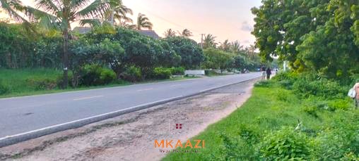 Prime 1-acre second-row beach plot for sale on Casuarina Road, Malindi, featuring private beach access, freehold title, water and electricity connections, and ideal for hospitality or luxury residential development.