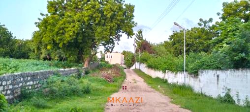 Prime 1-acre second-row beach plot for sale on Casuarina Road, Malindi, featuring private beach access, freehold title, water and electricity connections, and ideal for hospitality or luxury residential development.