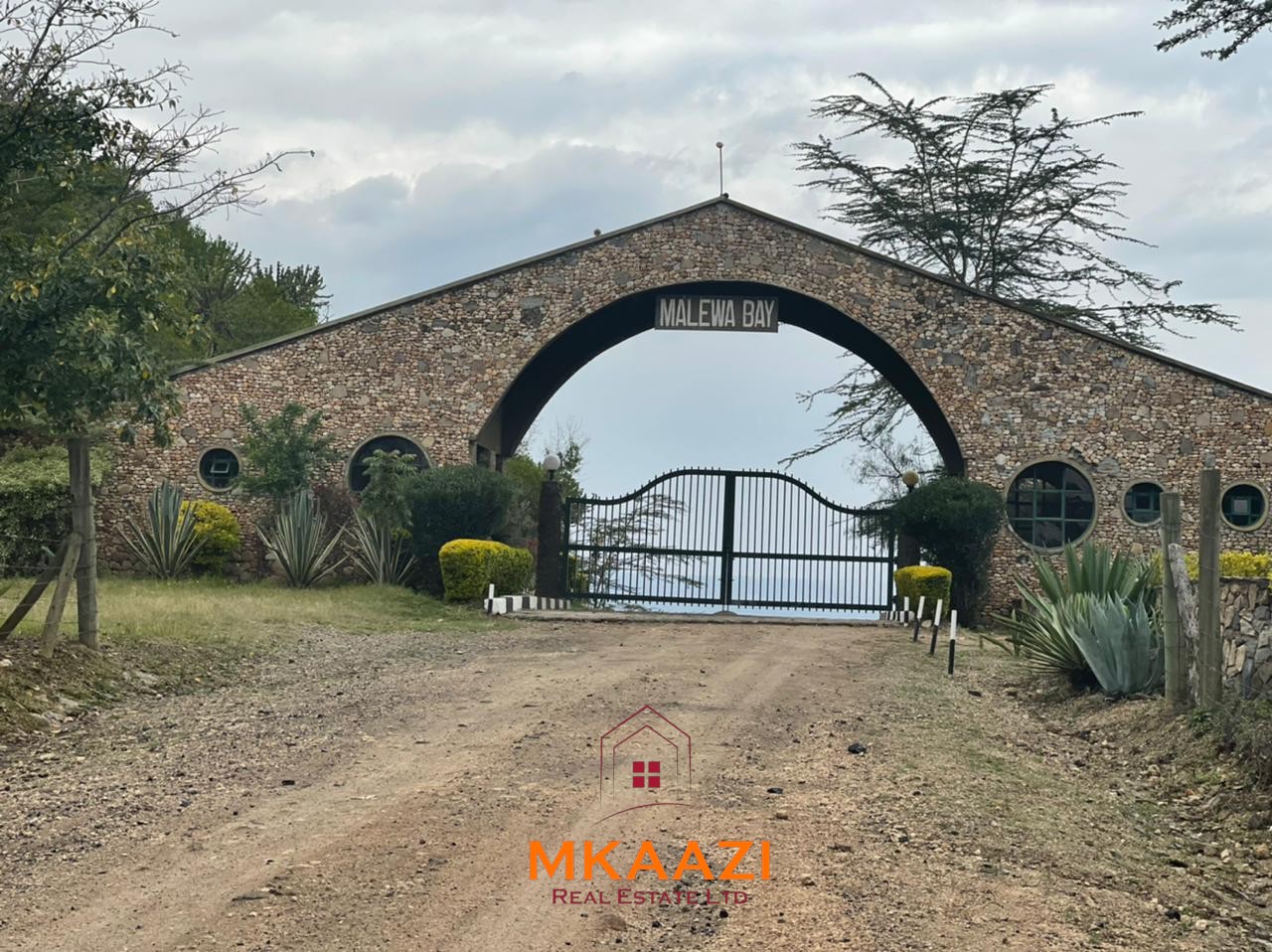 3-acre lake-view property in Malewa Bay Naivasha opposite Rift Valley Golf Club with ready title, fencing, piped water, and development potential.