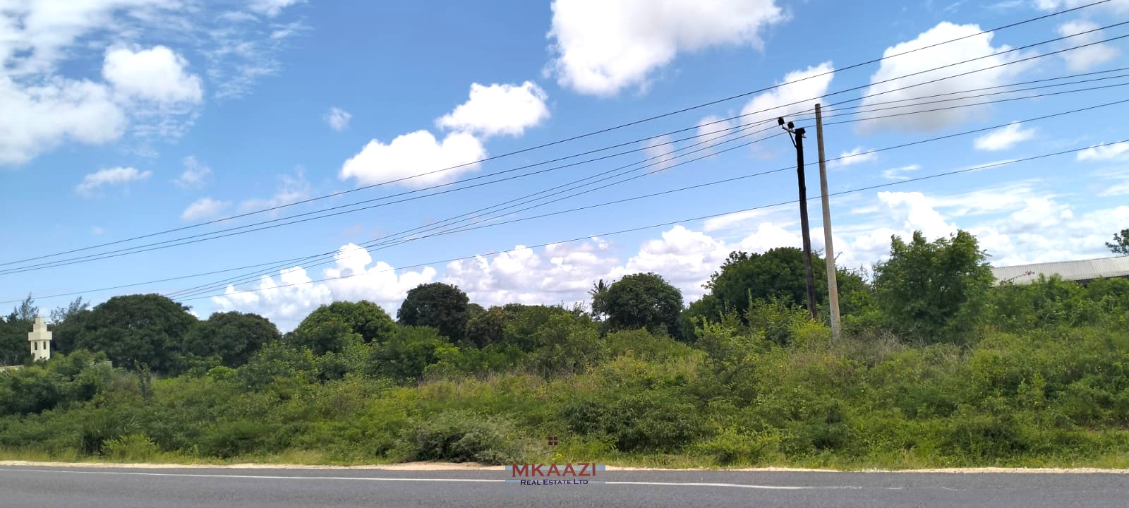 2-acre road frontage land for sale on Mombasa Road Kizingo with freehold title, power and water on site, ideal for commercial and mixed-use development.