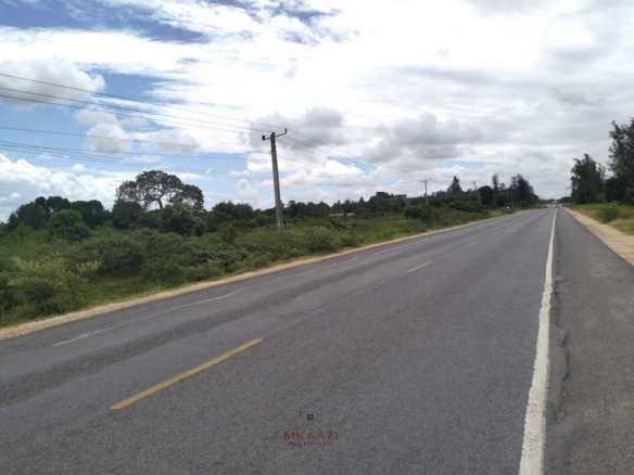 2-acre road frontage land for sale on Mombasa Road Kizingo with freehold title, power and water on site, ideal for commercial and mixed-use development.