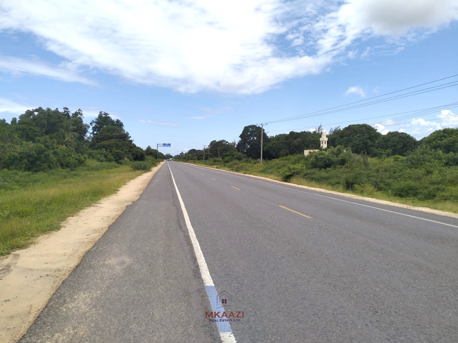 2-acre road frontage land for sale on Mombasa Road Kizingo with freehold title, power and water on site, ideal for commercial and mixed-use development.