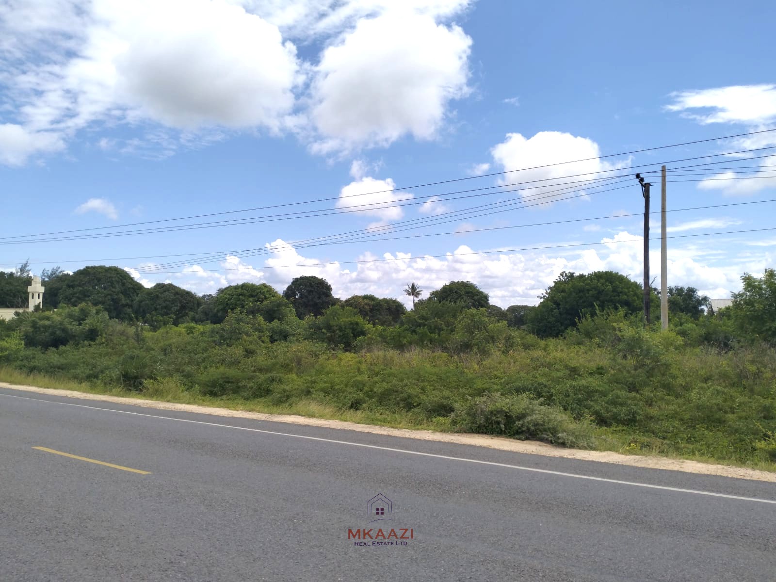 2-acre road frontage land for sale on Mombasa Road Kizingo with freehold title, power and water on site, ideal for commercial and mixed-use development.