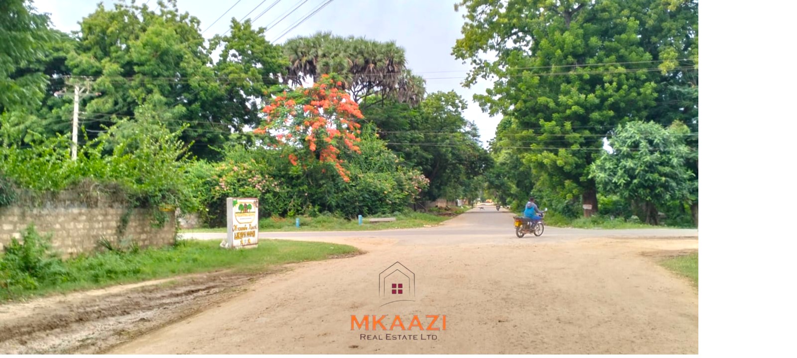 Quarter-acre plot for sale next to Mwembe Resort Malindi with ready title deed, perimeter wall, water and electricity on site.