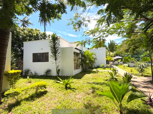 Luxury fully furnished twin villas for sale on Turtle Bay Road Watamu near Temple Point and LichtHaus featuring 4 bedrooms total, proven hospitality income, 70% occupancy rates, private terraces, DSQ, and strong ROI potential.