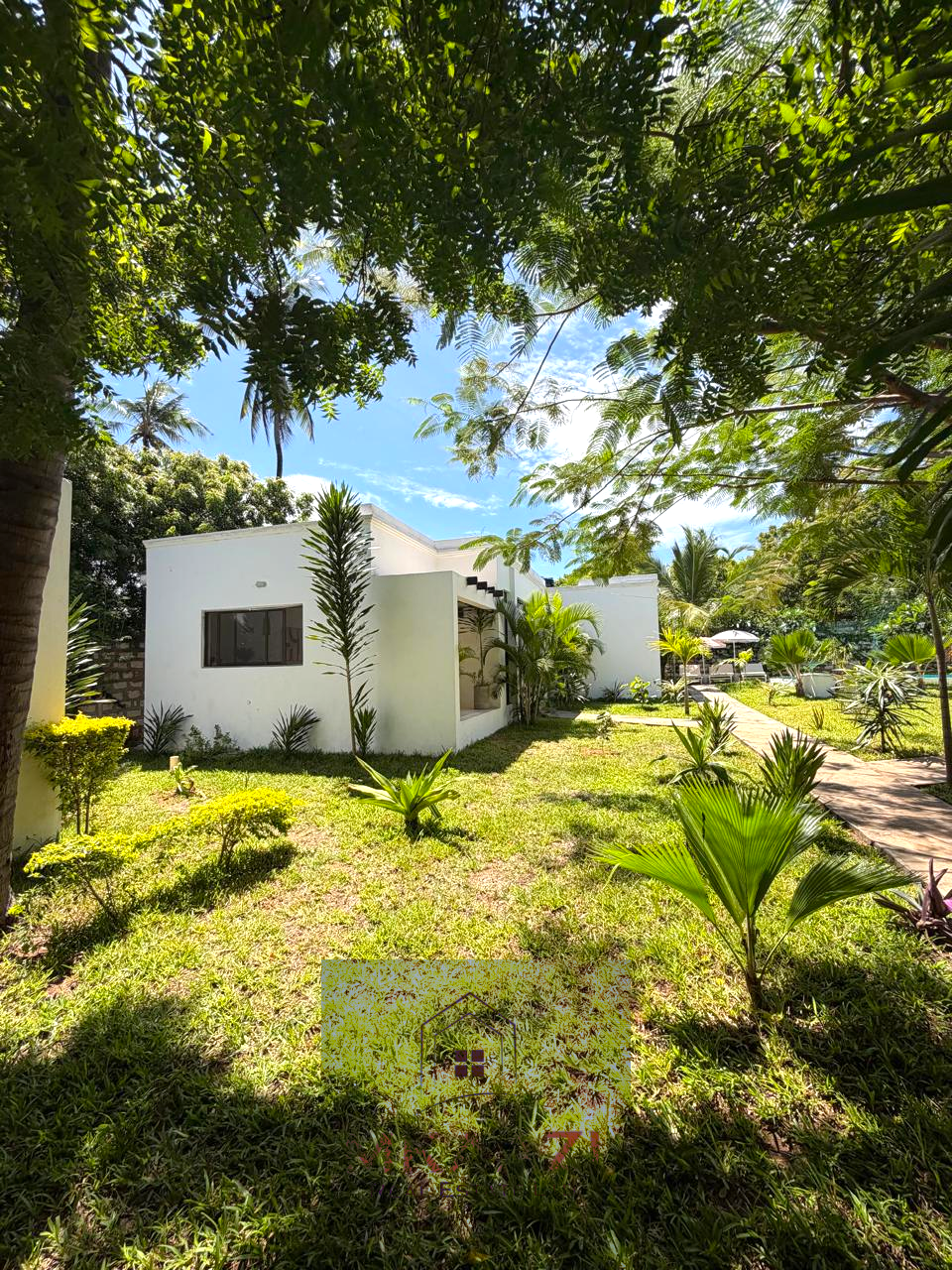 Luxury fully furnished twin villas for sale on Turtle Bay Road Watamu near Temple Point and LichtHaus featuring 4 bedrooms total, proven hospitality income, 70% occupancy rates, private terraces, DSQ, and strong ROI potential.