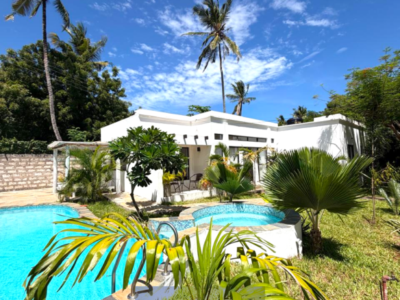 Luxury fully furnished twin villas for sale on Turtle Bay Road Watamu near Temple Point and LichtHaus featuring 4 bedrooms total, proven hospitality income, 70% occupancy rates, private terraces, DSQ, and strong ROI potential.