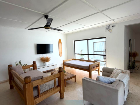 Luxury fully furnished twin villas for sale on Turtle Bay Road Watamu near Temple Point and LichtHaus featuring 4 bedrooms total, proven hospitality income, 70% occupancy rates, private terraces, DSQ, and strong ROI potential.
