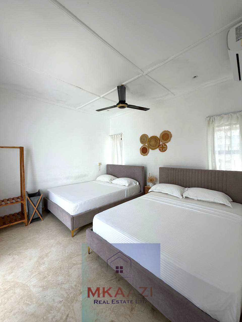 Luxury fully furnished twin villas for sale on Turtle Bay Road Watamu near Temple Point and LichtHaus featuring 4 bedrooms total, proven hospitality income, 70% occupancy rates, private terraces, DSQ, and strong ROI potential.