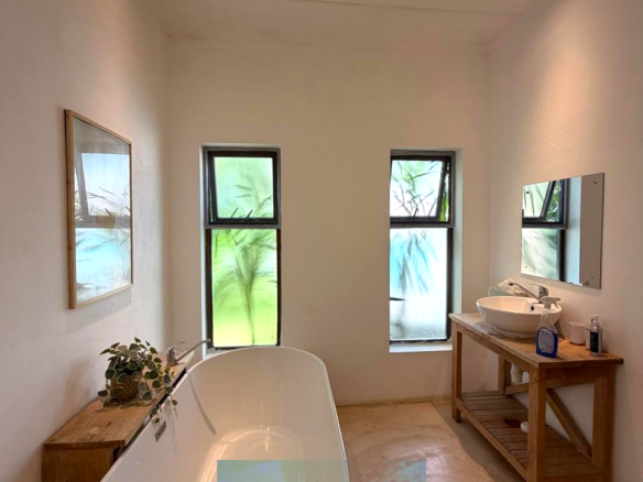 Luxury fully furnished twin villas for sale on Turtle Bay Road Watamu near Temple Point and LichtHaus featuring 4 bedrooms total, proven hospitality income, 70% occupancy rates, private terraces, DSQ, and strong ROI potential.