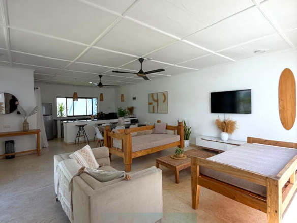 Luxury fully furnished twin villas for sale on Turtle Bay Road Watamu near Temple Point and LichtHaus featuring 4 bedrooms total, proven hospitality income, 70% occupancy rates, private terraces, DSQ, and strong ROI potential.