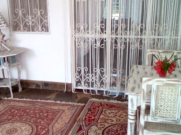Fully furnished 2-bedroom luxury apartment for sale in Silver Rock Malindi along Casuarina Road featuring beach access, swimming pool, private garden, spacious rooms, porch, bathtub, and 24/7 security.