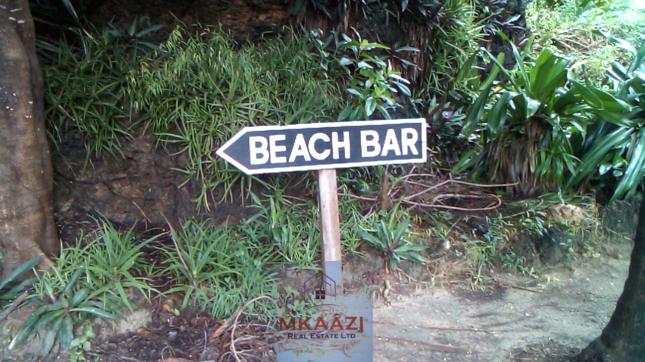 Fully furnished 2-bedroom luxury apartment for sale in Silver Rock Malindi along Casuarina Road featuring beach access, swimming pool, private garden, spacious rooms, porch, bathtub, and 24/7 security.
