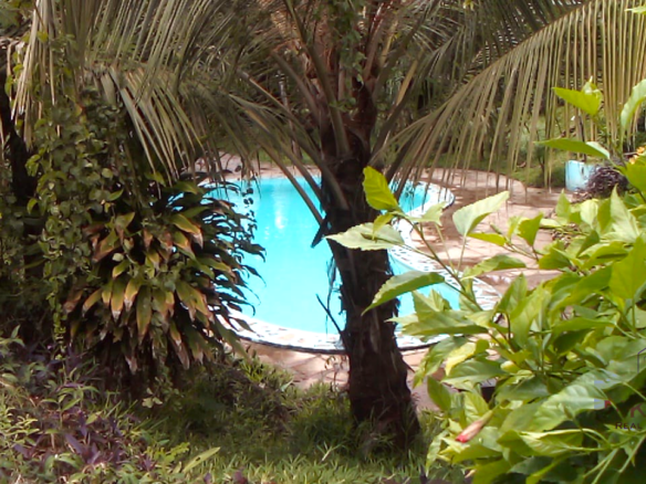 Fully furnished 2-bedroom luxury apartment for sale in Silver Rock Malindi along Casuarina Road featuring beach access, swimming pool, private garden, spacious rooms, porch, bathtub, and 24/7 security.