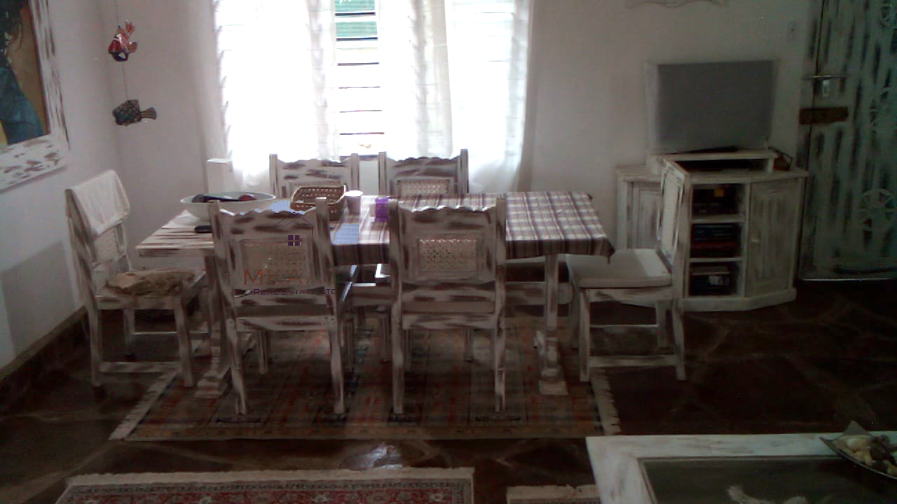 Fully furnished 2-bedroom luxury apartment for sale in Silver Rock Malindi along Casuarina Road featuring beach access, swimming pool, private garden, spacious rooms, porch, bathtub, and 24/7 security.