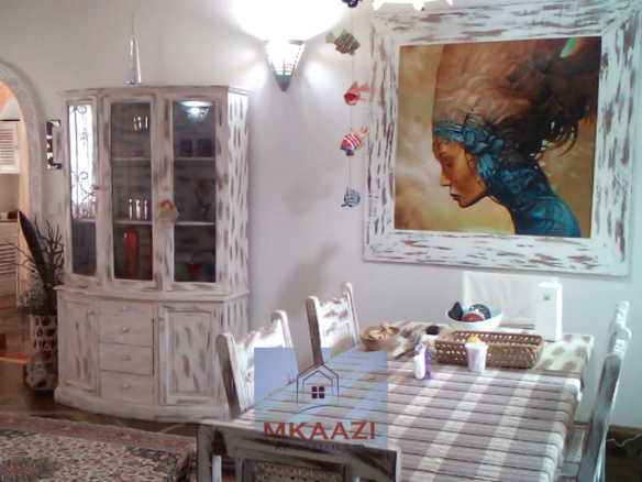 Fully furnished 2-bedroom luxury apartment for sale in Silver Rock Malindi along Casuarina Road featuring beach access, swimming pool, private garden, spacious rooms, porch, bathtub, and 24/7 security.
