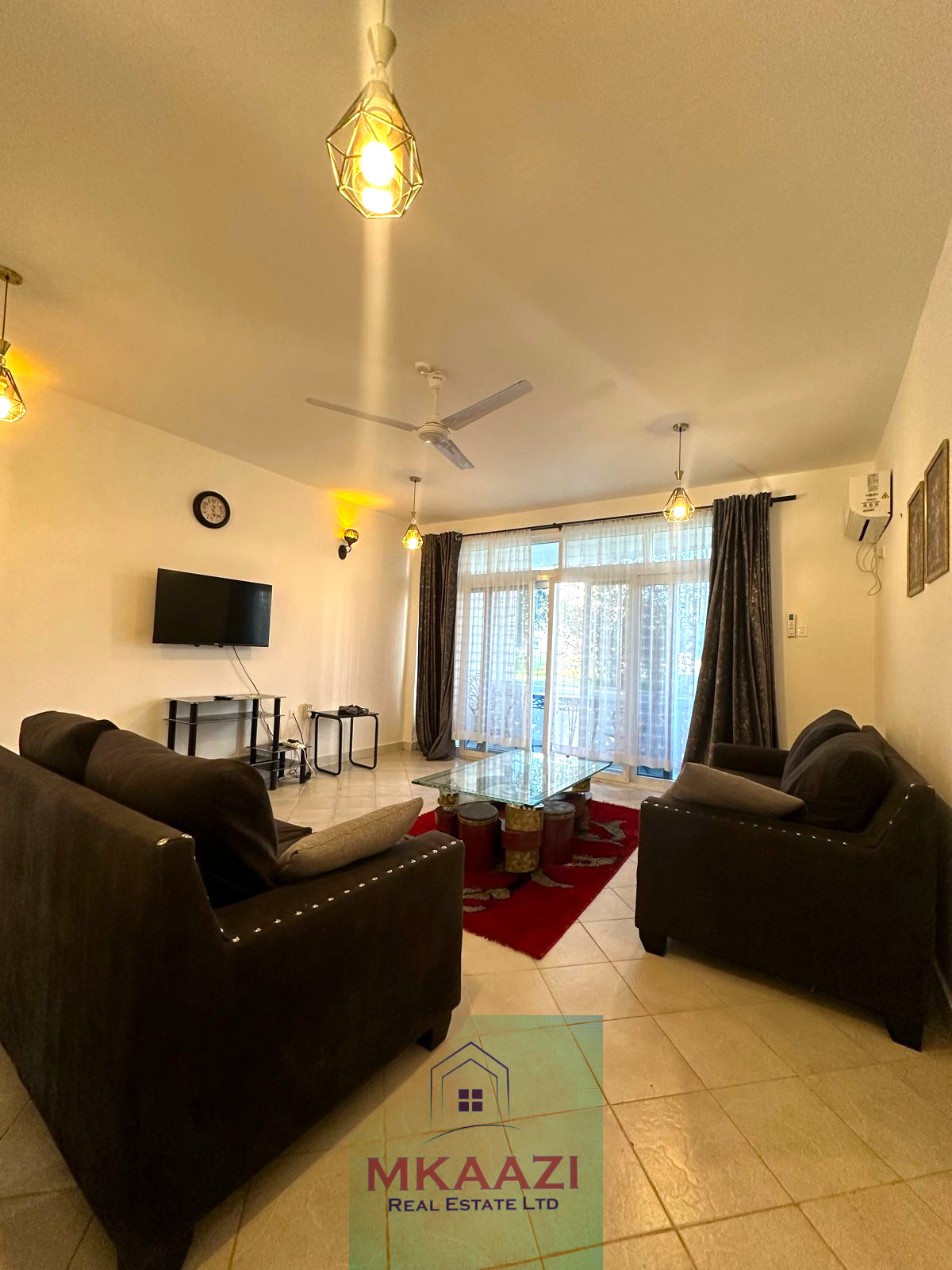 Fully furnished 2-bedroom apartment for sale in Kijani Malindi featuring spacious bedrooms, balcony views, swimming pool access, and walking distance to the beach.