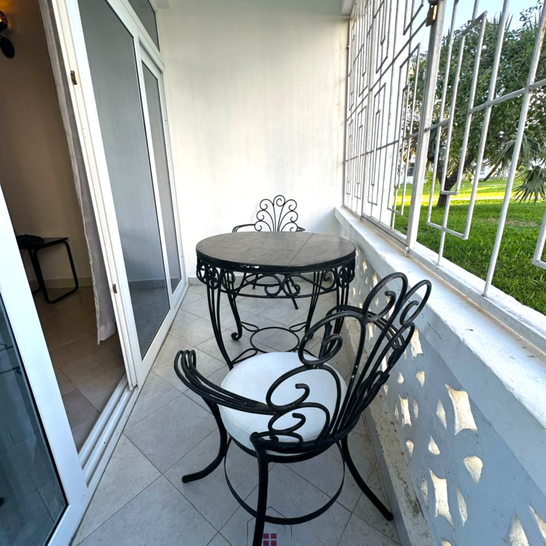 Fully furnished 2-bedroom apartment for sale in Kijani Malindi featuring spacious bedrooms, balcony views, swimming pool access, and walking distance to the beach.