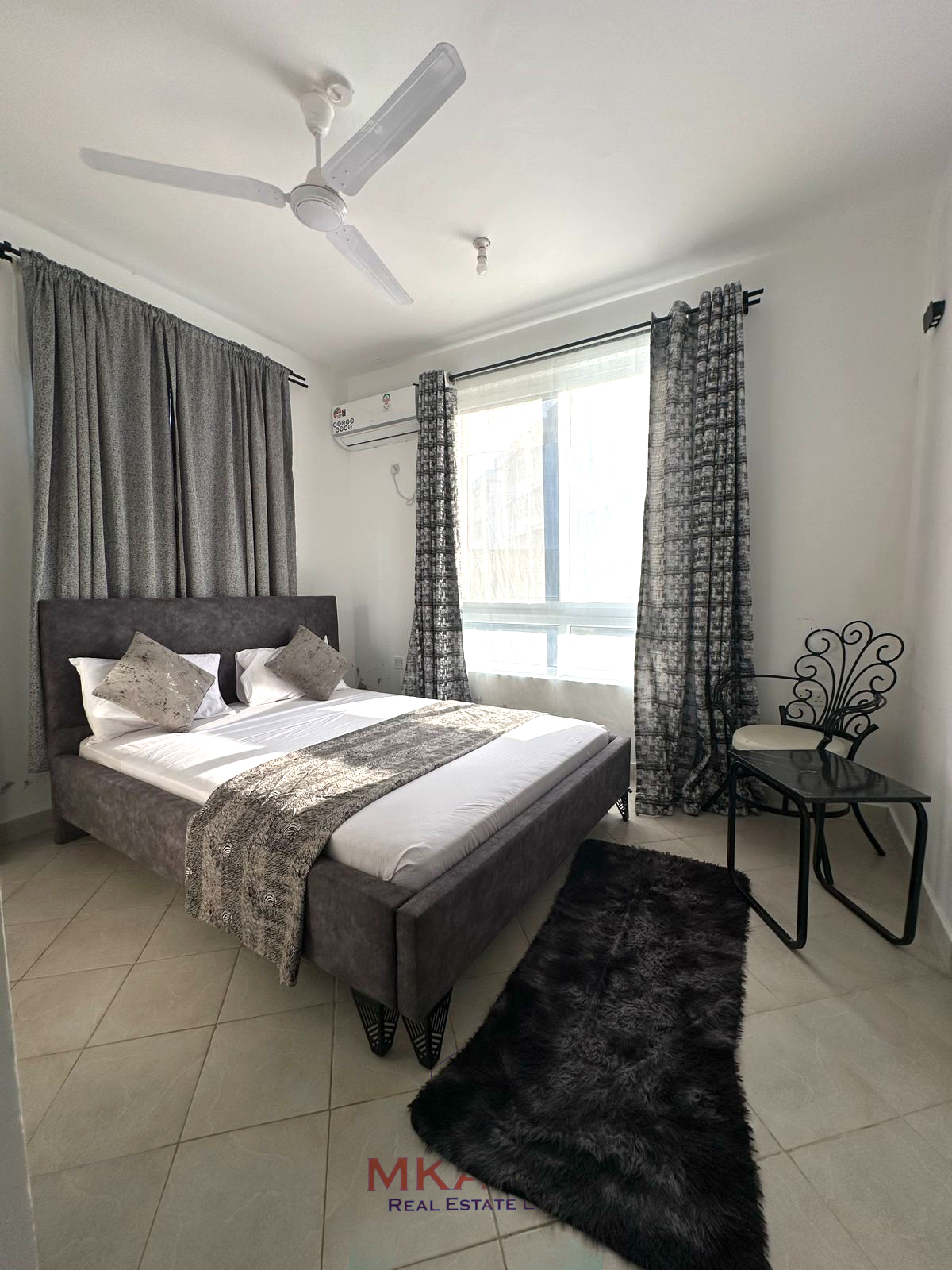 Fully furnished 2-bedroom apartment for sale in Kijani Malindi featuring spacious bedrooms, balcony views, swimming pool access, and walking distance to the beach.