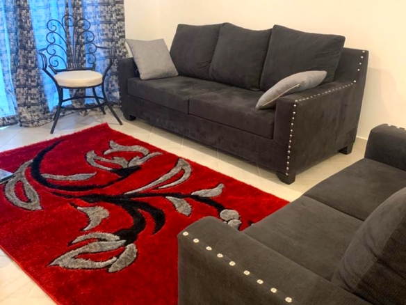 Fully furnished 2-bedroom apartment for sale in Kijani Malindi featuring spacious bedrooms, balcony views, swimming pool access, and walking distance to the beach.
