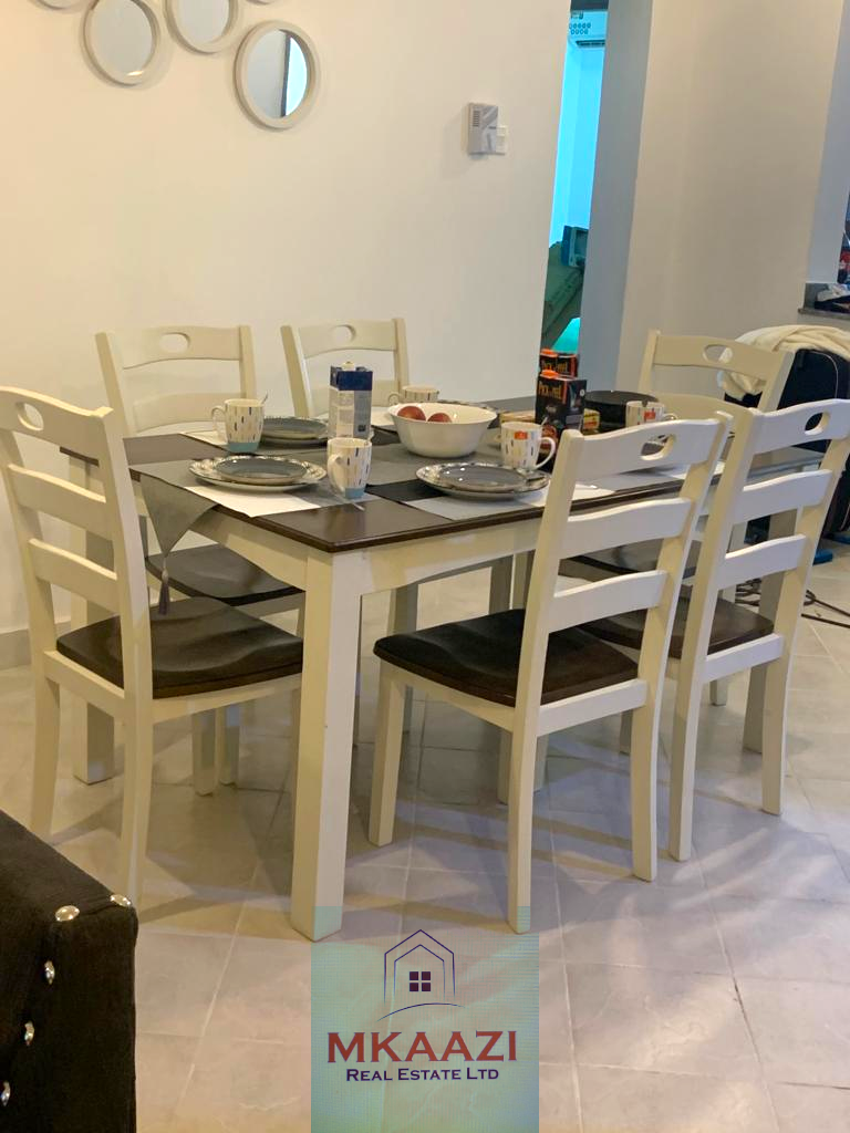 Fully furnished 2-bedroom apartment for sale in Kijani Malindi featuring spacious bedrooms, balcony views, swimming pool access, and walking distance to the beach.