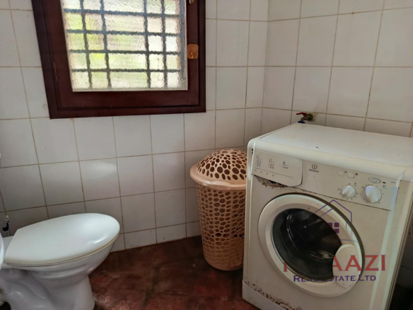 3-bedroom all en-suite semi-furnished villa for sale in Kilimandogo, Malindi featuring a private garden, servant's quarter, two swimming pools, 24-hour security, and secure gated community living. Ideal for family residence, holiday home, retirement living, or rental investment.