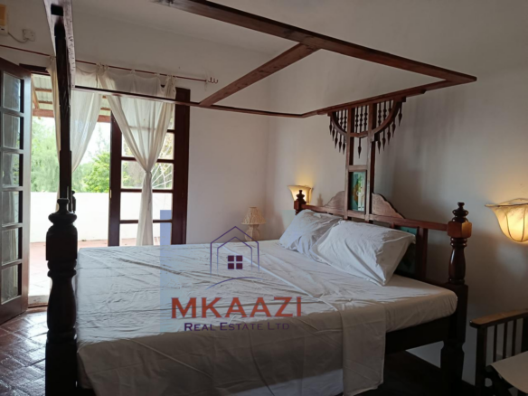 3-bedroom all en-suite semi-furnished villa for sale in Kilimandogo, Malindi featuring a private garden, servant's quarter, two swimming pools, 24-hour security, and secure gated community living. Ideal for family residence, holiday home, retirement living, or rental investment.