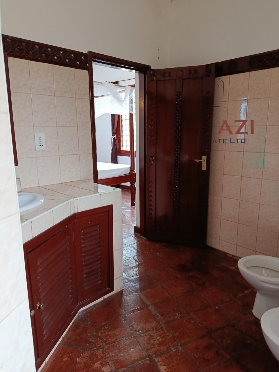 3-bedroom all en-suite semi-furnished villa for sale in Kilimandogo, Malindi featuring a private garden, servant's quarter, two swimming pools, 24-hour security, and secure gated community living. Ideal for family residence, holiday home, retirement living, or rental investment.