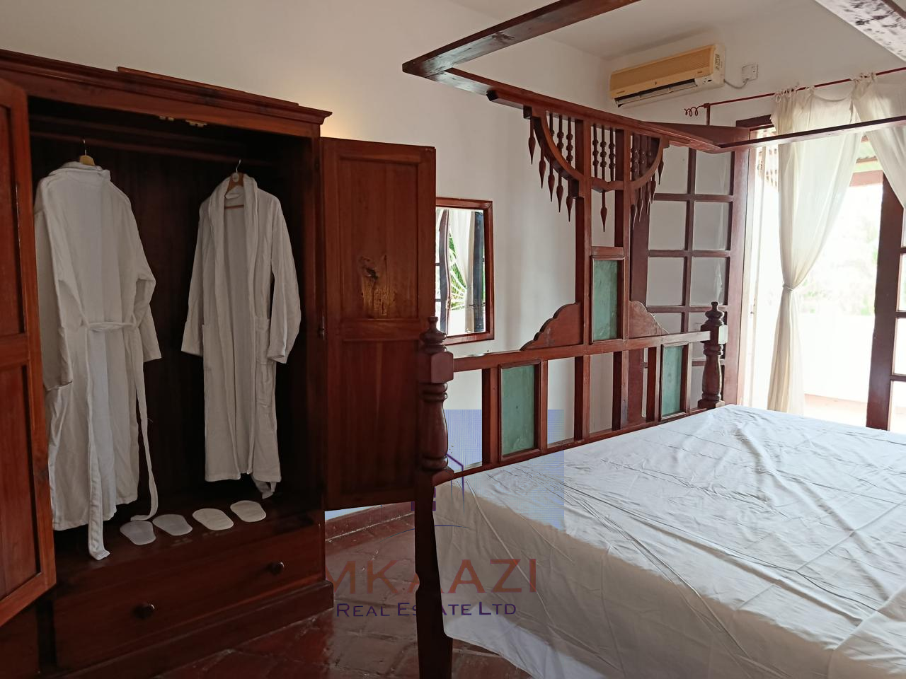 3-bedroom all en-suite semi-furnished villa for sale in Kilimandogo, Malindi featuring a private garden, servant's quarter, two swimming pools, 24-hour security, and secure gated community living. Ideal for family residence, holiday home, retirement living, or rental investment.