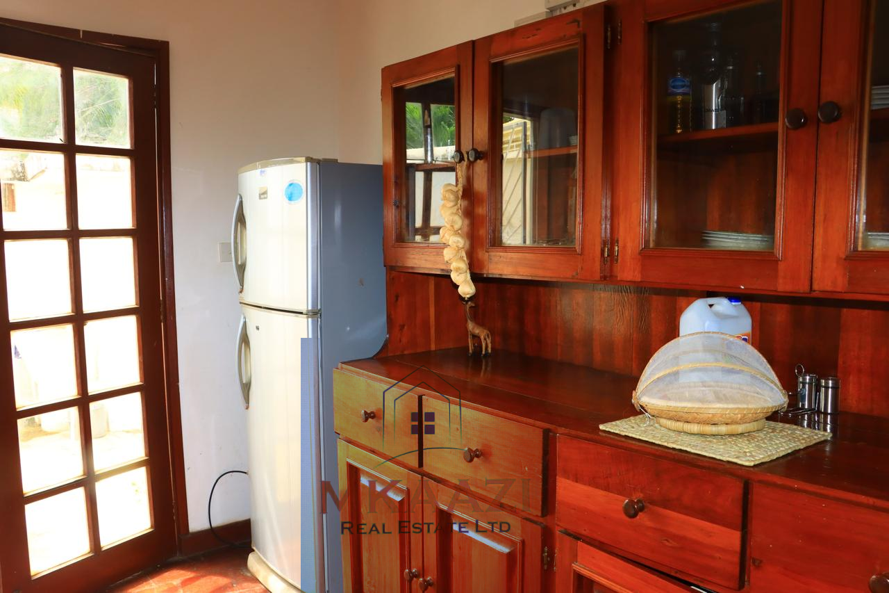 3-bedroom all en-suite semi-furnished villa for sale in Kilimandogo, Malindi featuring a private garden, servant's quarter, two swimming pools, 24-hour security, and secure gated community living. Ideal for family residence, holiday home, retirement living, or rental investment.