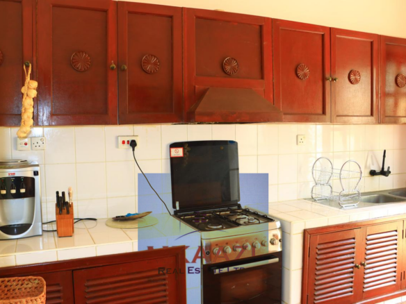 3-bedroom all en-suite semi-furnished villa for sale in Kilimandogo, Malindi featuring a private garden, servant's quarter, two swimming pools, 24-hour security, and secure gated community living. Ideal for family residence, holiday home, retirement living, or rental investment.