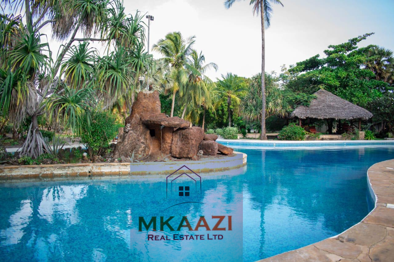 3-bedroom all en-suite semi-furnished villa for sale in Kilimandogo, Malindi featuring a private garden, servant's quarter, two swimming pools, 24-hour security, and secure gated community living. Ideal for family residence, holiday home, retirement living, or rental investment.