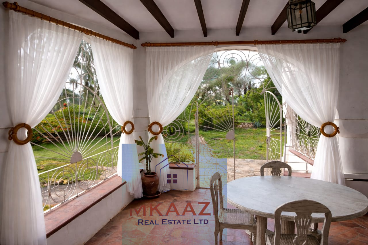 3-bedroom all en-suite semi-furnished villa for sale in Kilimandogo, Malindi featuring a private garden, servant's quarter, two swimming pools, 24-hour security, and secure gated community living. Ideal for family residence, holiday home, retirement living, or rental investment.