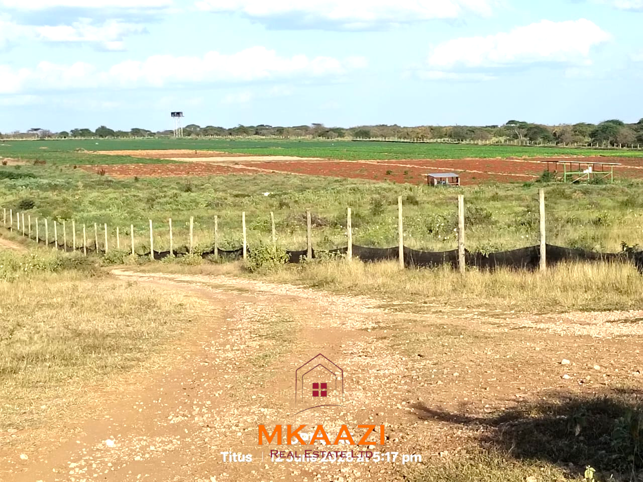 7-acre freehold agricultural land for sale in Megumi featuring fertile red soil, good road access, groundwater potential, clean title deed, and suitability for farming, livestock keeping, agro-processing, and land banking.