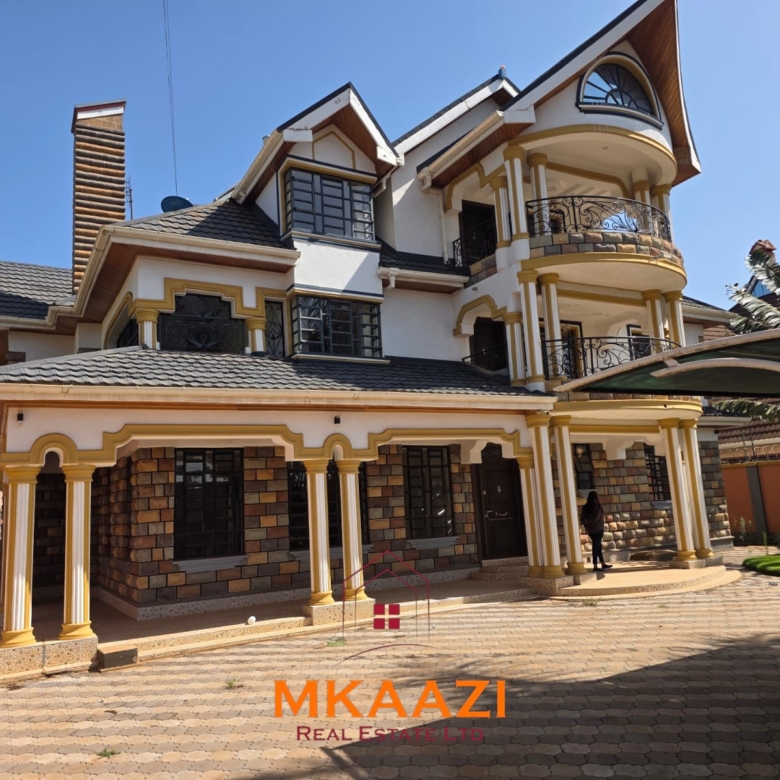 Luxury 6-bedroom all-ensuite mansion for sale in Githingiri Estate, Thika, featuring a gym, safe room, CCTV surveillance, automated gate, electrified perimeter wall, and 35,000-litre underground water tank.