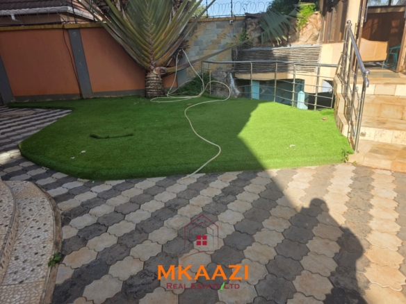 Luxury 6-bedroom all-ensuite mansion for sale in Githingiri Estate, Thika, featuring a gym, safe room, CCTV surveillance, automated gate, electrified perimeter wall, and 35,000-litre underground water tank.