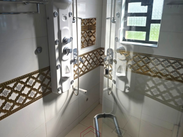 Luxury 6-bedroom all-ensuite mansion for sale in Githingiri Estate, Thika, featuring a gym, safe room, CCTV surveillance, automated gate, electrified perimeter wall, and 35,000-litre underground water tank.