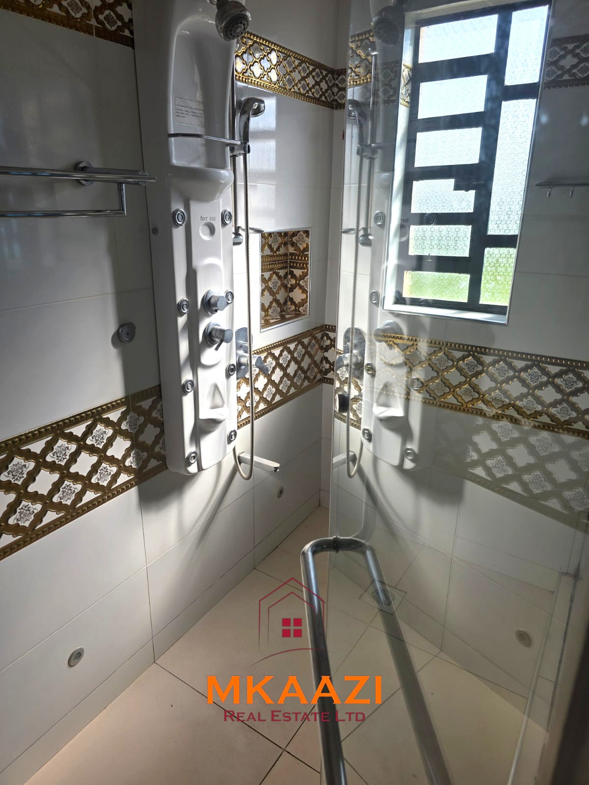 Luxury 6-bedroom all-ensuite mansion for sale in Githingiri Estate, Thika, featuring a gym, safe room, CCTV surveillance, automated gate, electrified perimeter wall, and 35,000-litre underground water tank.
